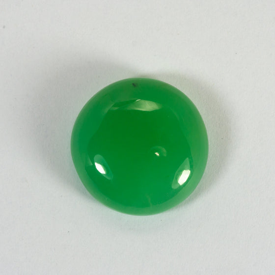This natural piece of chrysoprase was mined in Queensland Australia. The piece is a stunning and consistent mid apple green. It is incredibly clean and should set with no inclusions visible,n