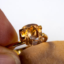  This lovely natural zircon has a sublte light yellow/orange tone and great sparkle from an excellent cut.