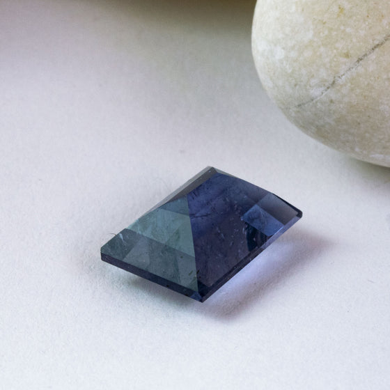 This beautiful violet iolite was faceted by one of the members of the women's lapidary collective