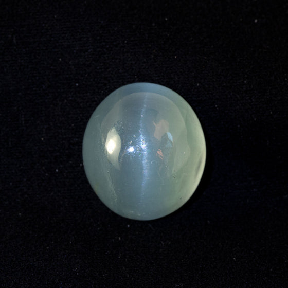 This lovely softly toned aquamarine has a striking yet subtle cat's eye effect. This piece is unheated and was responsibly sourced from Madagascar.