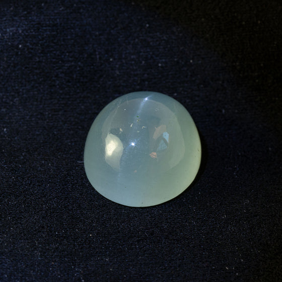 This lovely softly toned aquamarine has a striking yet subtle cat's eye effect. This piece is unheated and was responsibly sourced from Madagascar.