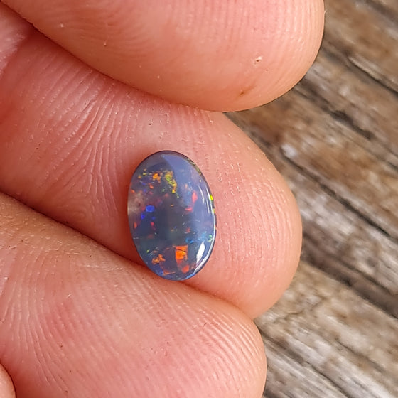 0.39ct Black Opal Oval Cut