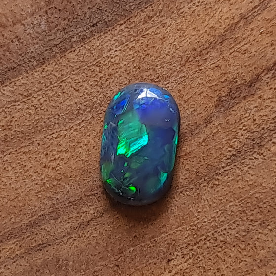 1.01ct Black Opal Oval Cabochon