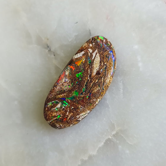 8.60ct Freeform Opalized Wood/Pipe Opal