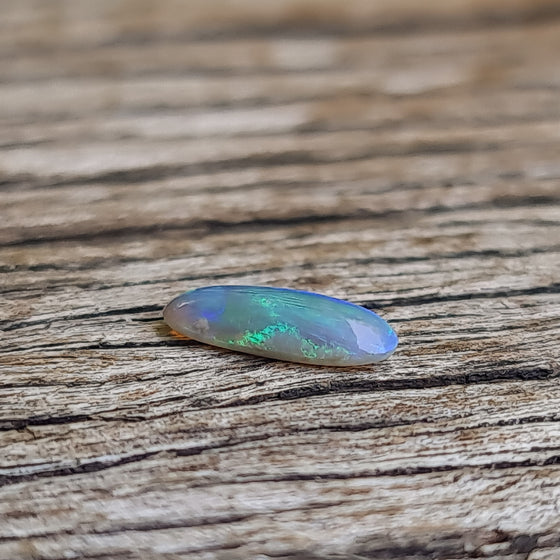 0.96ct Elongated Oval Semi-Black Opal Cabochon