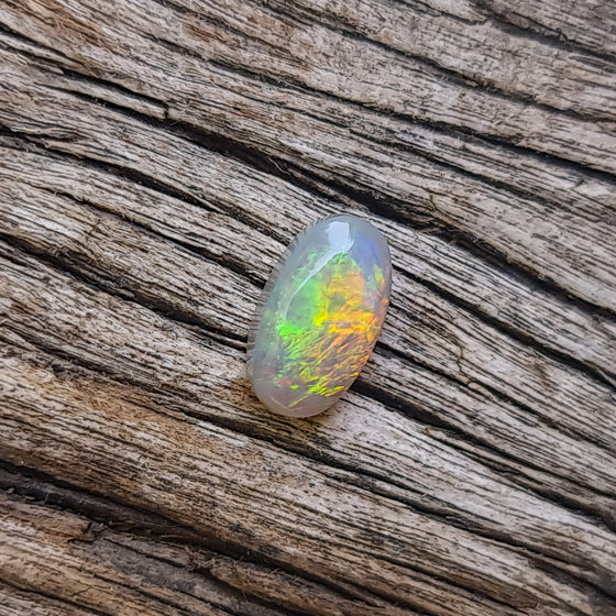 0.67ct Oval Cut Semi-Black Opal Cabochon