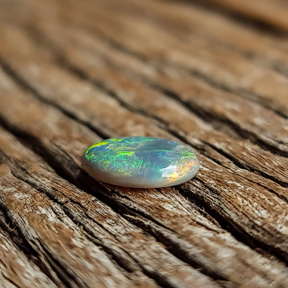 1.37ct Oval Semi-Black Opal Cabochon