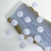 A set of 12 pieces of .6mm round cabs, pale blue Lace Agate. Suitable for rings.