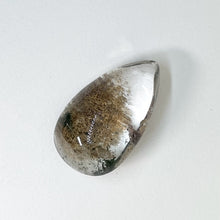  This Chunky pendant piece of Lodolite crystal is very good quality, the crystal is very clear and the inclusions defined. Garden Quartz, also called Inclusion Quartz, or Phantom Quartz