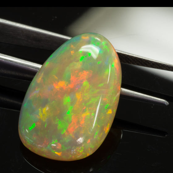 Top Quality 13.42ct Free Form Cabochon Ethiopian Opal